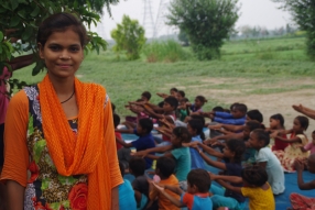 One of the tutors we are training, at one of the slums in India where Charity United's educational programs are in place.