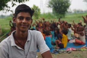 One of the tutors we are training, at one of the slums in India where Charity United's educational programs are in place.