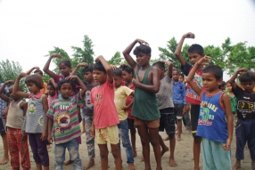 Classes being held at one of the slums in India where Charity United’s educational programs are in operation.