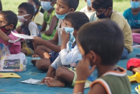 Classes being held at one of the slums in India where Charity United’s educational programs are in operation.