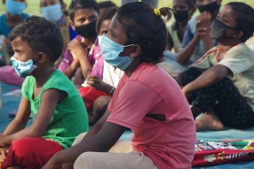 Classes being held at one of the slums in India where Charity United’s educational programs are in operation.