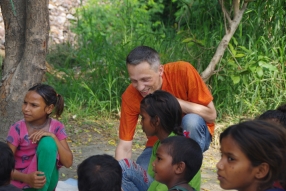 Classes being held at one of the slums in India where Charity United’s educational programs are in operation.