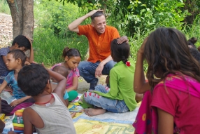 Classes being held at one of the slums in India where Charity United’s educational programs are in operation.