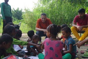 Classes being held at one of the slums in India where Charity United’s educational programs are in operation.