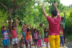 Classes being held at one of the slums in India where Charity United’s educational programs are in operation.