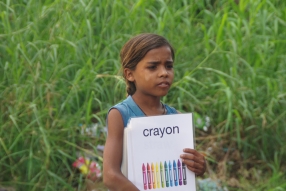 Classes being held at one of the slums in India where Charity United’s educational programs are in operation.