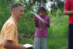 Classes being held at one of the slums in India where Charity United’s educational programs are in operation.