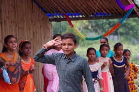 The community celebrates the new educational program that has been introduced to their village, at one of the slums in India where Charity United's educational programs are now in place.