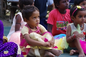 The community celebrates the new educational program that has been introduced to their village, at one of the slums in India where Charity United's educational programs are now in place.