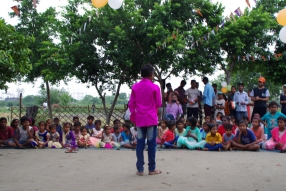 The community celebrates the new educational program that has been introduced to their village, at one of the slums in India where Charity United's educational programs are now in place.