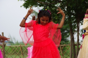 The community celebrates the new educational program that has been introduced to their village, at one of the slums in India where Charity United's educational programs are now in place.