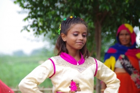 The community celebrates the new educational program that has been introduced to their village, at one of the slums in India where Charity United's educational programs are now in place.