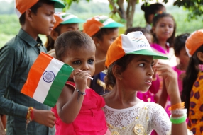 The community celebrates the new educational program that has been introduced to their village, at one of the slums in India where Charity United's educational programs are now in place.