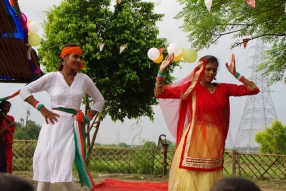 The community celebrates the new educational program that has been introduced to their village, at one of the slums in India where Charity United's educational programs are now in place.