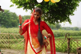 The community celebrates the new educational program that has been introduced to their village, at one of the slums in India where Charity United's educational programs are now in place.