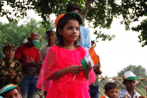 The community celebrates the new educational program that has been introduced to their village, at one of the slums in India where Charity United's educational programs are now in place.