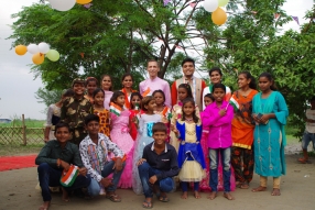 The community celebrates the new educational program that has been introduced to their village, at one of the slums in India where Charity United's educational programs are now in place.