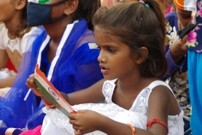 The community celebrates the new educational program that has been introduced to their village, at one of the slums in India where Charity United's educational programs are now in place.