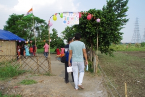 The community celebrates the new educational program that has been introduced to their village, at one of the slums in India where Charity United's educational programs are now in place.