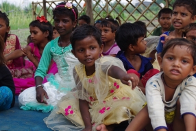 The community celebrates the new educational program that has been introduced to their village, at one of the slums in India where Charity United's educational programs are now in place.