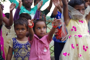 The community celebrates the new educational program that has been introduced to their village, at one of the slums in India where Charity United's educational programs are now in place.