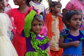 The community celebrates the new educational program that has been introduced to their village, at one of the slums in India where Charity United's educational programs are now in place.