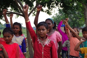 The community celebrates the new educational program that has been introduced to their village, at one of the slums in India where Charity United's educational programs are now in place.