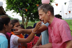 The community celebrates the new educational program that has been introduced to their village, at one of the slums in India where Charity United's educational programs are now in place.