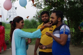 The community celebrates the new educational program that has been introduced to their village, at one of the slums in India where Charity United's educational programs are now in place.