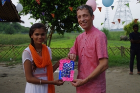 The community celebrates the new educational program that has been introduced to their village, at one of the slums in India where Charity United's educational programs are now in place.