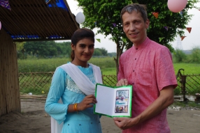 The community celebrates the new educational program that has been introduced to their village, at one of the slums in India where Charity United's educational programs are now in place.