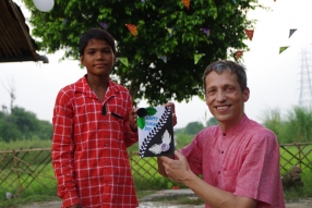 The community celebrates the new educational program that has been introduced to their village, at one of the slums in India where Charity United's educational programs are now in place.