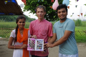 The community celebrates the new educational program that has been introduced to their village, at one of the slums in India where Charity United's educational programs are now in place.