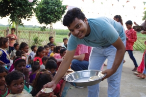 The community celebrates the new educational program that has been introduced to their village, at one of the slums in India where Charity United's educational programs are now in place.