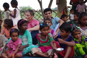 The community celebrates the new educational program that has been introduced to their village, at one of the slums in India where Charity United's educational programs are now in place.