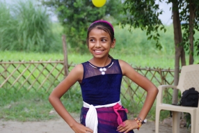 The community celebrates the new educational program that has been introduced to their village, at one of the slums in India where Charity United's educational programs are now in place.