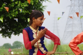 The community celebrates the new educational program that has been introduced to their village, at one of the slums in India where Charity United's educational programs are now in place.