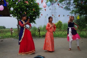 The community celebrates the new educational program that has been introduced to their village, at one of the slums in India where Charity United's educational programs are now in place.