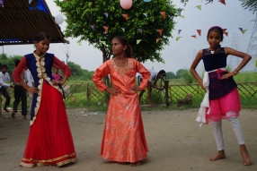 The community celebrates the new educational program that has been introduced to their village, at one of the slums in India where Charity United's educational programs are now in place.