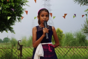 The community celebrates the new educational program that has been introduced to their village, at one of the slums in India where Charity United's educational programs are now in place.