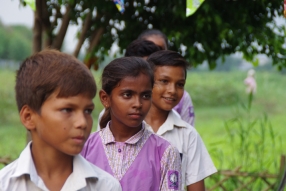 The community celebrates the new educational program that has been introduced to their village, at one of the slums in India where Charity United's educational programs are now in place.