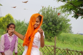 The community celebrates the new educational program that has been introduced to their village, at one of the slums in India where Charity United's educational programs are now in place.