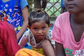 The community celebrates the new educational program that has been introduced to their village, at one of the slums in India where Charity United's educational programs are now in place.