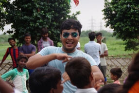 The community celebrates the new educational program that has been introduced to their village, at one of the slums in India where Charity United's educational programs are now in place.