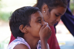 Classes being held at one of the slums in India where Charity United’s educational programs are in operation.