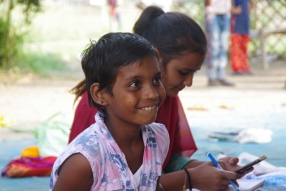 Classes being held at one of the slums in India where Charity United’s educational programs are in operation.