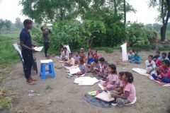 Classes being held at one of the slums in India where Charity United’s educational programs are in operation.