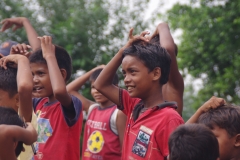 Classes being held at one of the slums in India where Charity United’s educational programs are in operation.