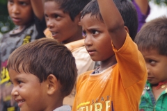 Classes being held at one of the slums in India where Charity United’s educational programs are in operation.