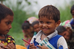 Classes being held at one of the slums in India where Charity United’s educational programs are in operation.